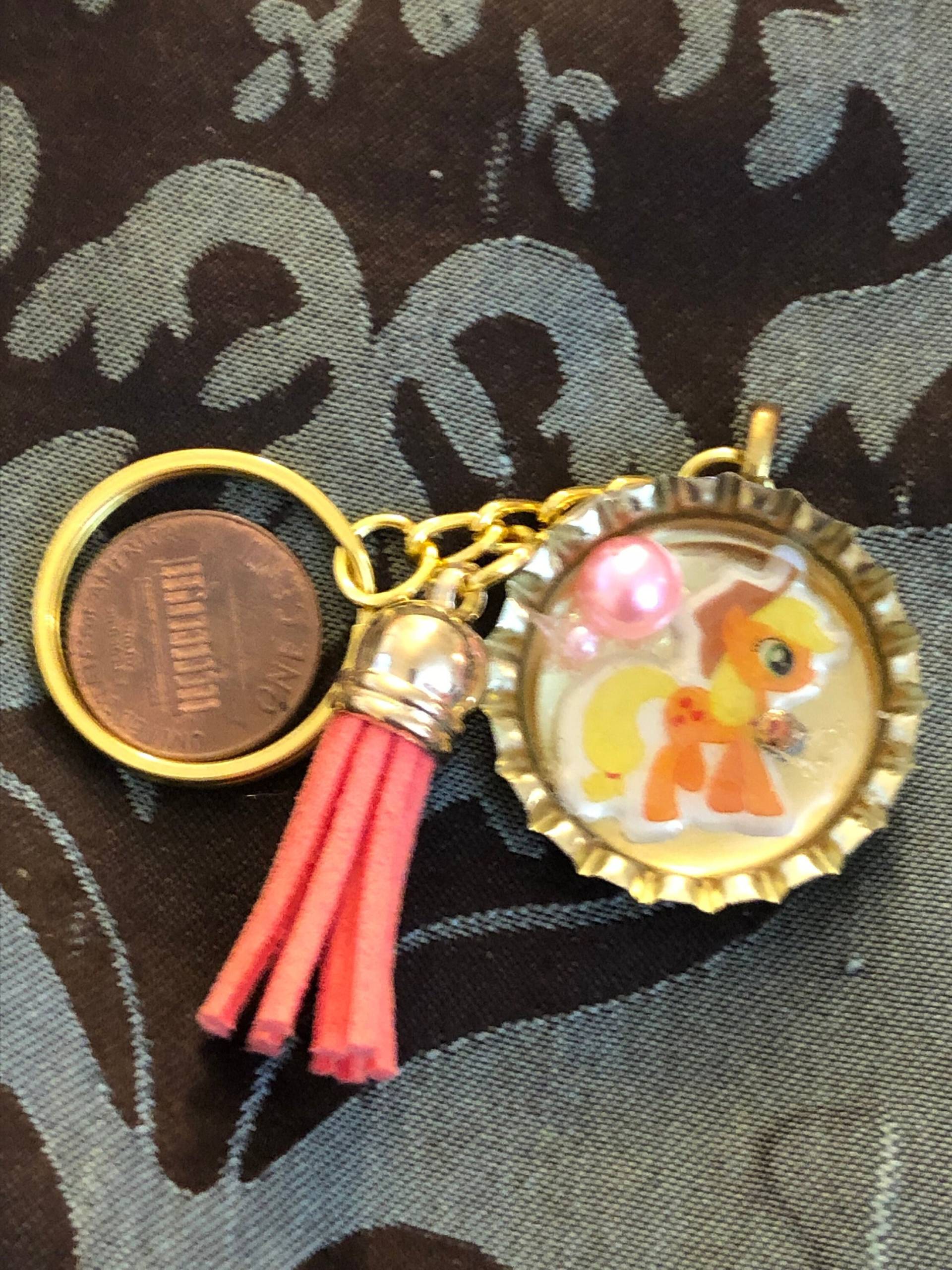 Applejack Kronkorken Schlüsselanhänger Applejack Kronkorken Schlüsselanhänger von KrystalGifts