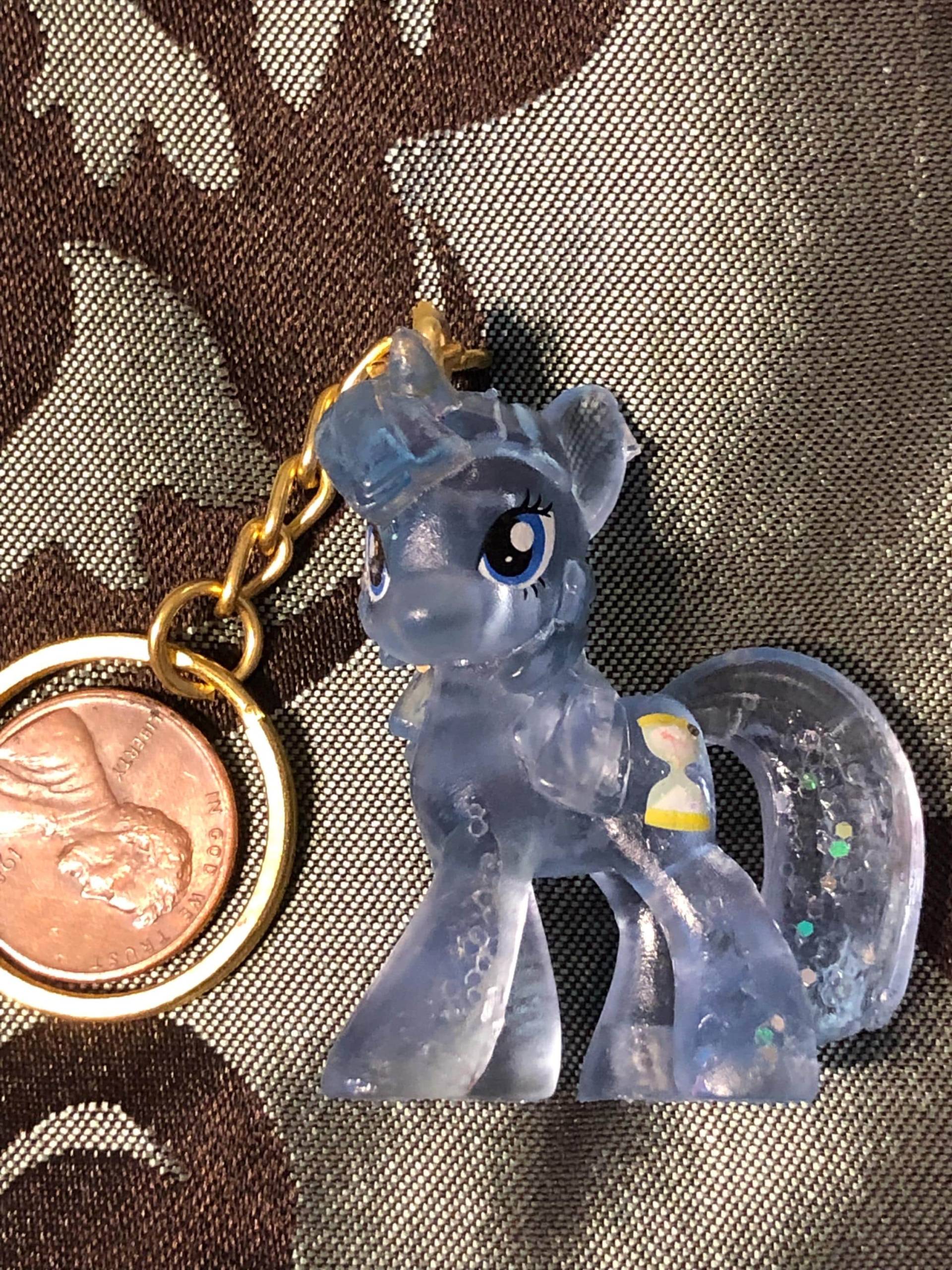 Hellblauer Und Goldfarbener Schlüsselanhänger Hellblauer Und Goldfarbener Schlüsselanhänger von KrystalGifts