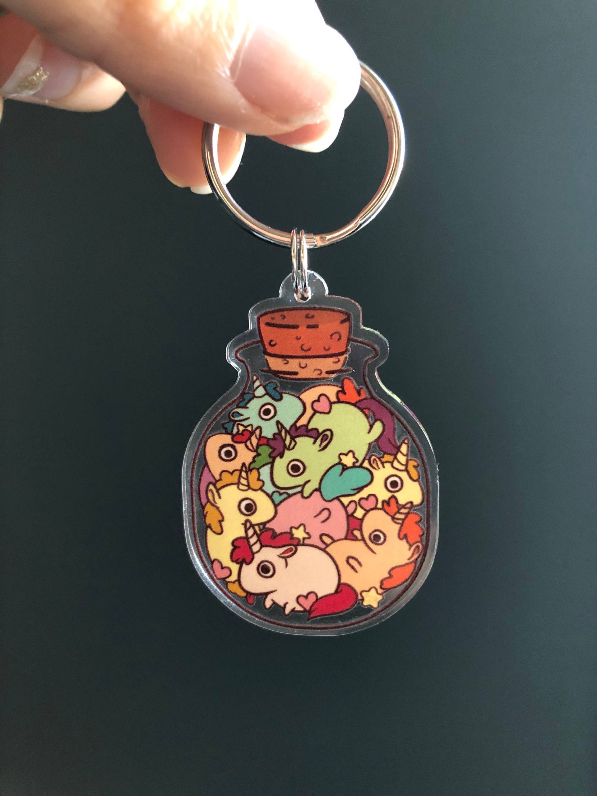 Einhörner in Einer Flasche Schlüsselanhänger Einhörner in Einer Flasche Schlüsselanhänger von KteaCrumpet