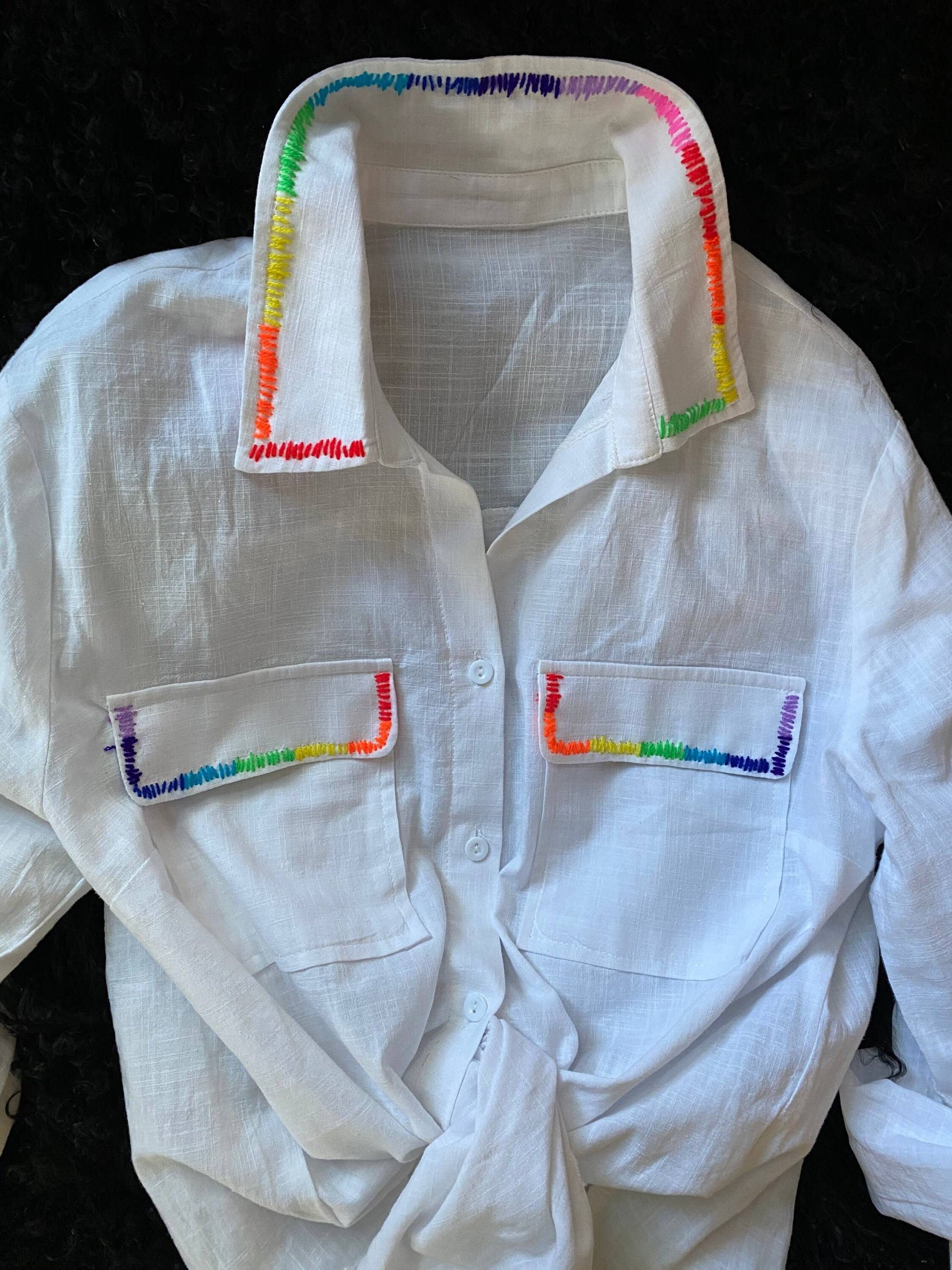 Handgestickter Regenbogenknopf Unten Handgestickter Regenbogenknopf Unten von LANAPLATINDESIGN