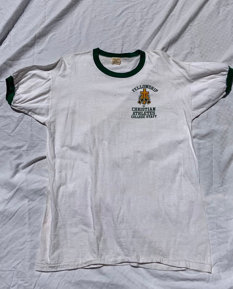 1980Er Jahre Weiß Und Grün Ringer Grafik T-Shirt von LaBombaVintage