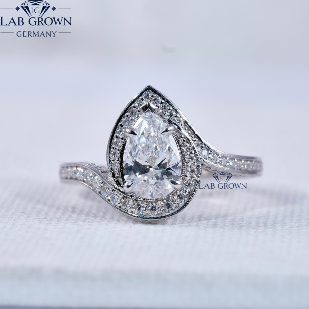 Pear Cut Swirl Brisur-Einstellung Lab Diamant Ehering Double Channel Band Zertifizierter Teardrop Designer Halo Weißgoldring Pear Cut Swirl Brisur-Einstellung Lab Diamant Ehering Double Channel Band Zertifizierter Teardrop Designer Halo Weißgoldring von LabgrownGermany