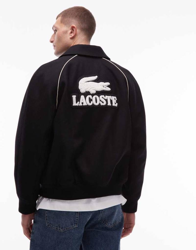 Lacoste - Bomberjacke in Schwarz mit Logo am Rücken von Lacoste