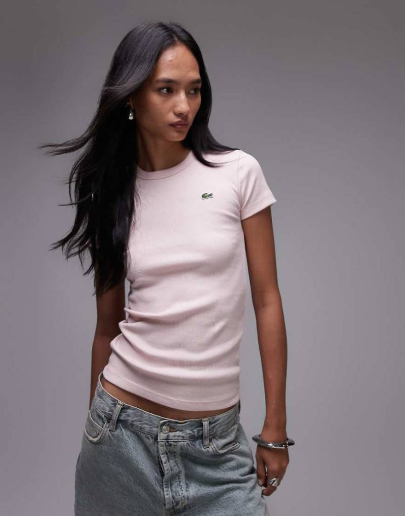 Lacoste - Geripptes T-Shirt in Rosa von Lacoste
