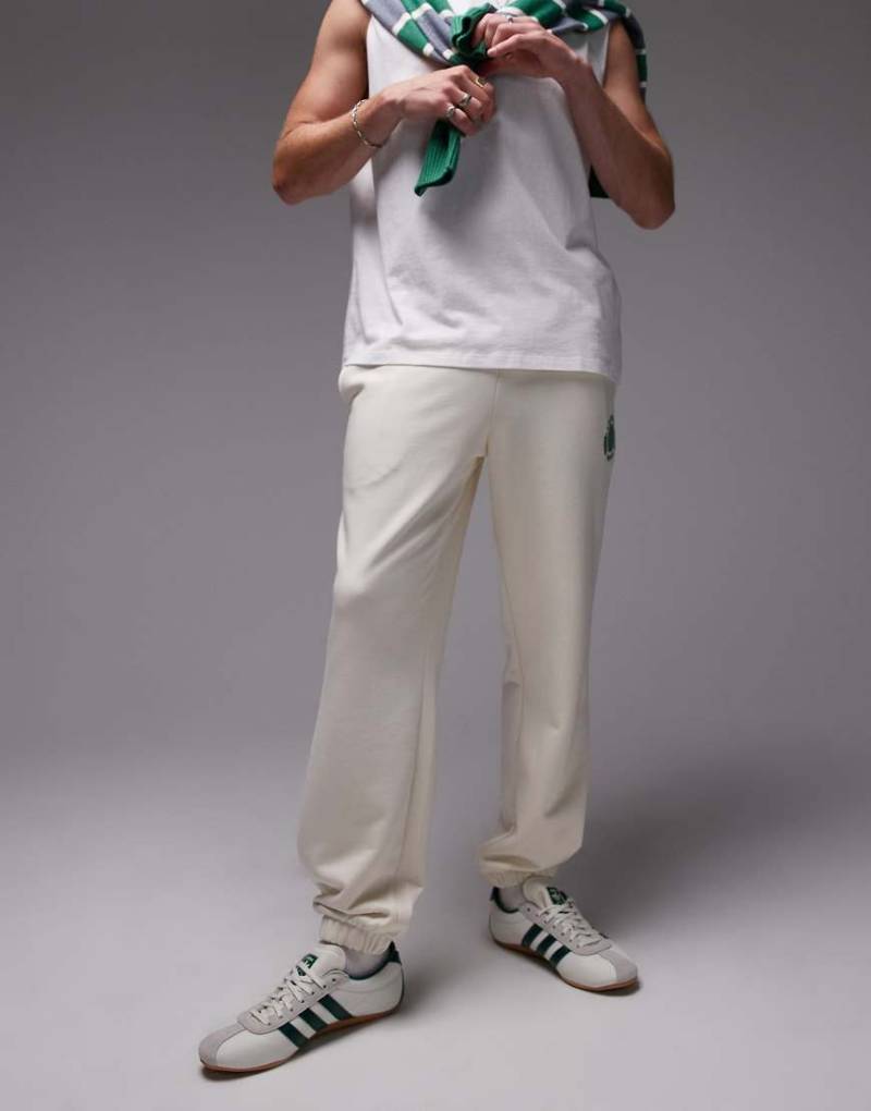 Lacoste - Jogginghose in Weiß mit Tennis-Emblem von Lacoste