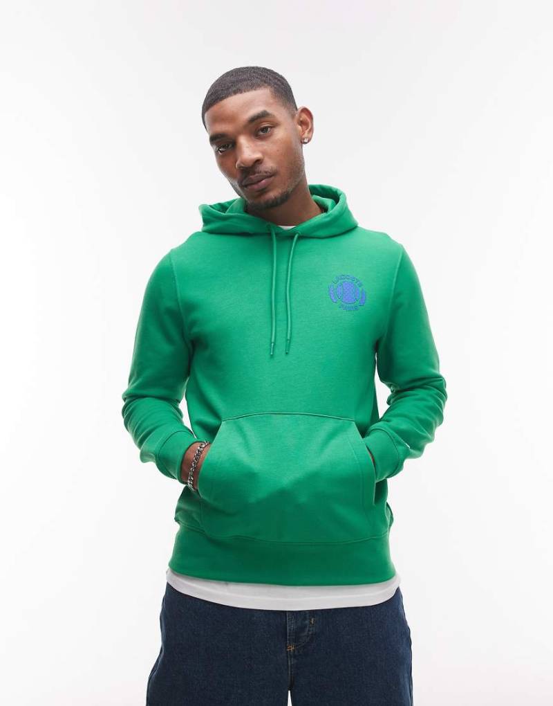 Lacoste - Kapuzenpullover in Grün mit Print auf Brust und Rücken von Lacoste