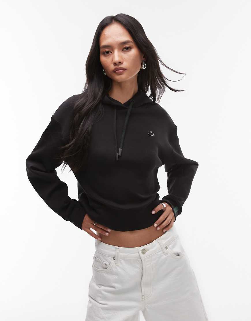 Lacoste - Kapuzenpullover in Schwarz Lacoste - Kapuzenpullover in Schwarz von Lacoste