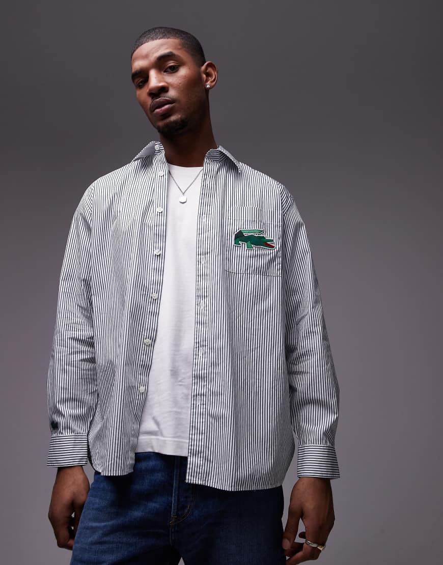 Lacoste - Langärmliges Hemd in Grün gestreift mit Logo von Lacoste