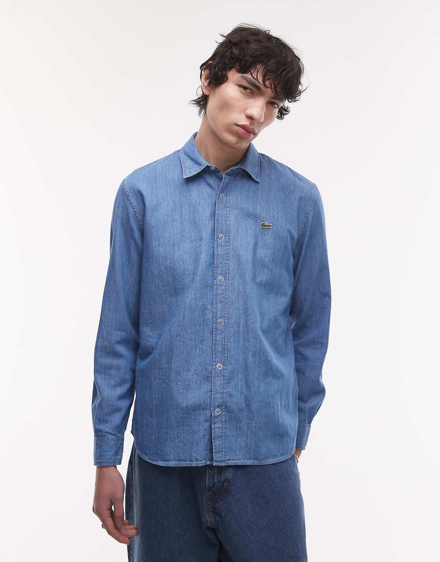 Lacoste - Langärmliges Jeanshemd in mittelblauer Waschung Lacoste - Langärmliges Jeanshemd in mittelblauer Waschung von Lacoste