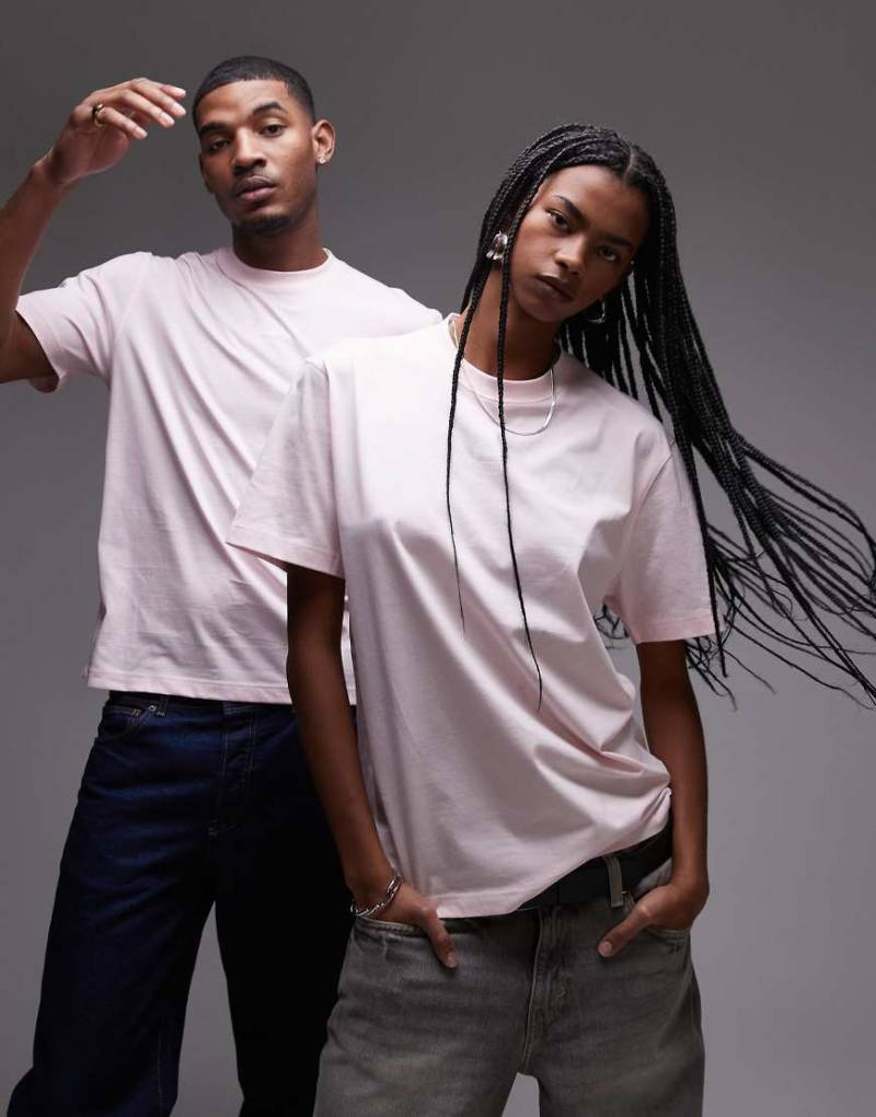 Lacoste - Locker geschnittenes Unisex-T-Shirt in Rosa mit kleinem mittigem Logoprint von Lacoste