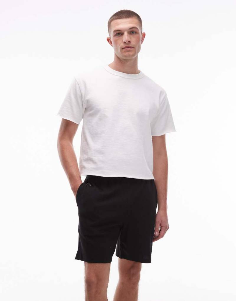 Lacoste - Loungewear-Shorts in Schwarz mit Waffelstruktur Lacoste - Loungewear-Shorts in Schwarz mit Waffelstruktur von Lacoste