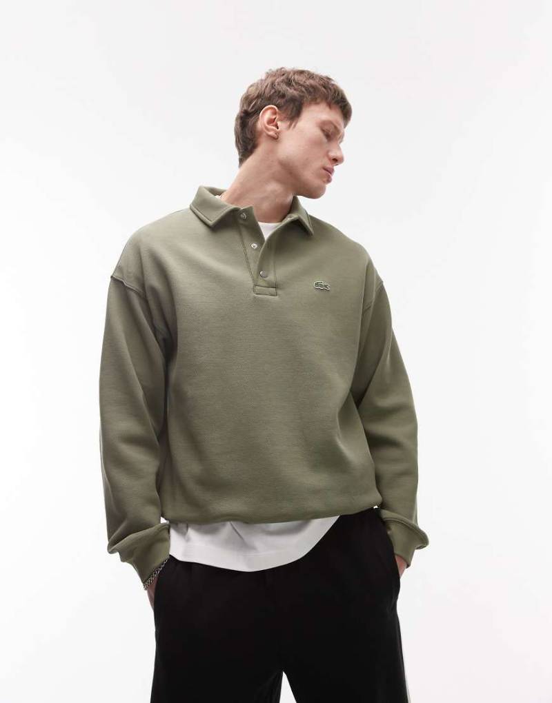 Lacoste - Oversize-Sweatshirt in Khaki mit geknöpftem Polo-Ausschnitt-Grün von Lacoste