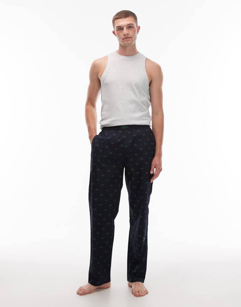 Lacoste - Pyjamahose in Marineblau mit All-over-Krokodil-Print Lacoste - Pyjamahose in Marineblau mit All-over-Krokodil-Print von Lacoste
