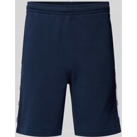 Lacoste Regular Fit Sweatshorts mit Galonstreifen in Blau, Größe XS Lacoste Regular Fit Sweatshorts mit Galonstreifen in Blau, Größe XS von Lacoste