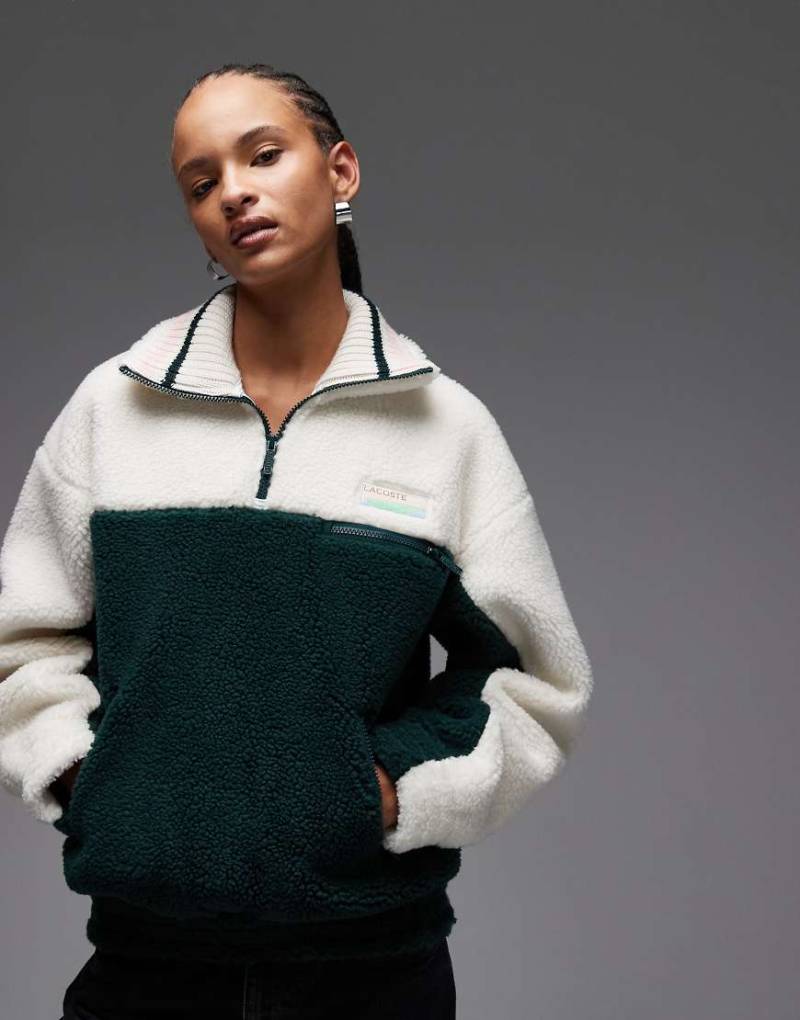 Lacoste - Sweatshirt in Grün mit Polokragen von Lacoste