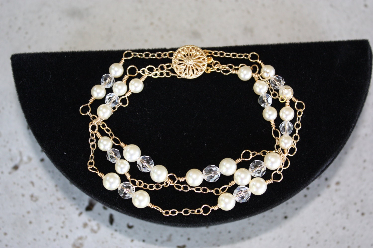 Dreistrangiges Brautarmband Mit Kristallen Und Perlen von LalleBridalJewelry