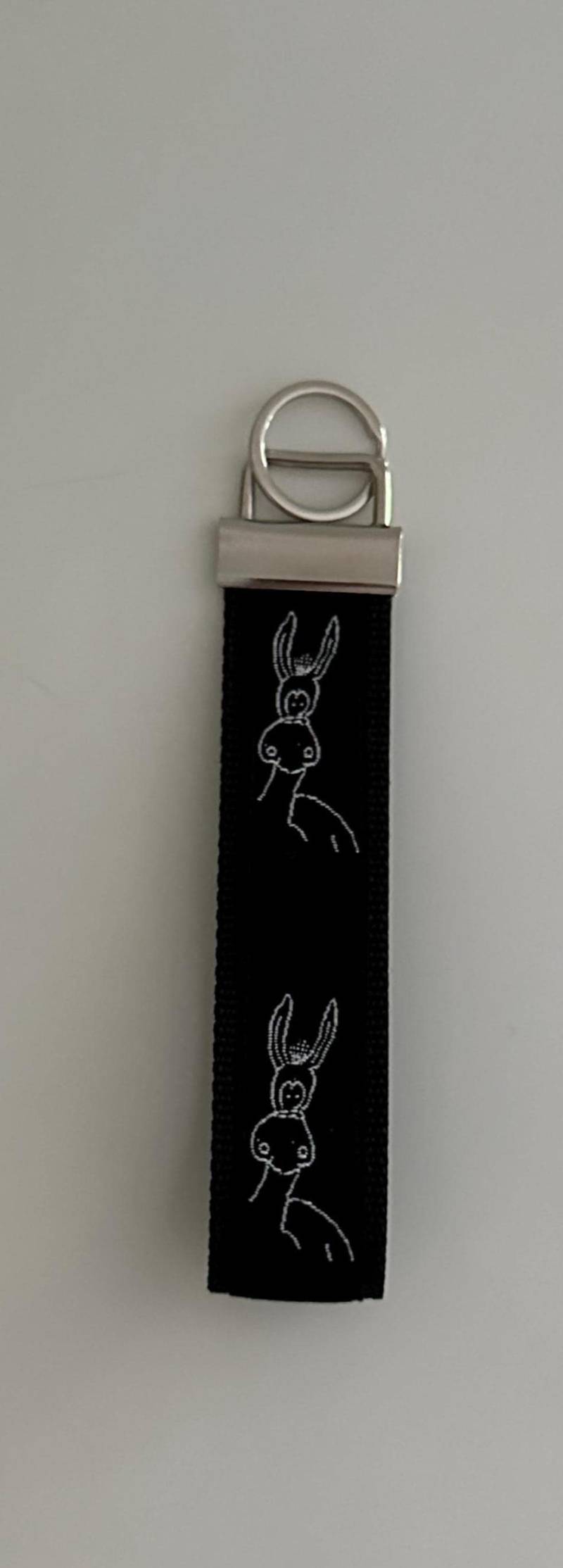 Schlüsselband Motiv Esel Schwarz Weißes Webband Auf Schwarzem Gurtband von Landwerke