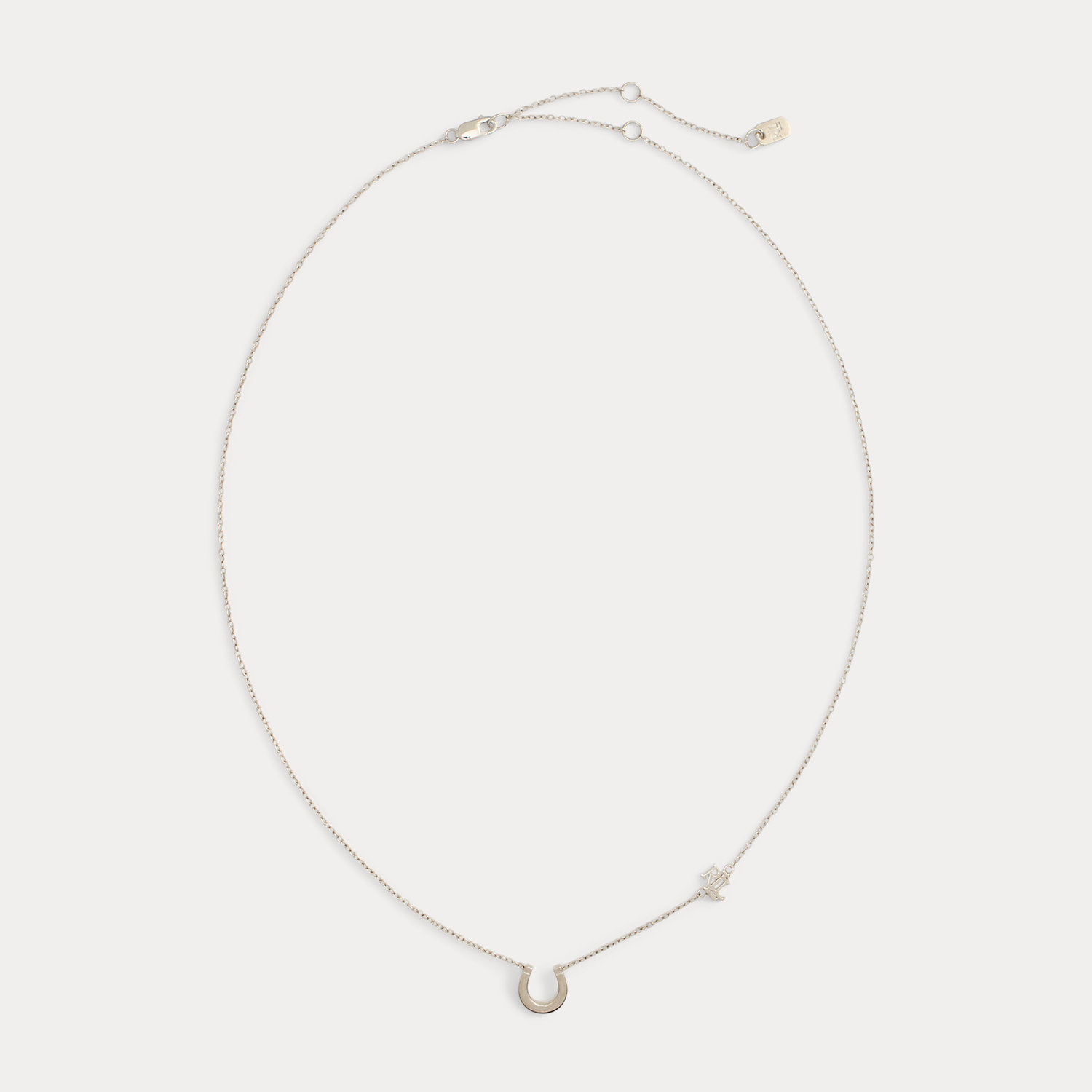 Silberhalskette mit Hufeisen und Logo von Lauren