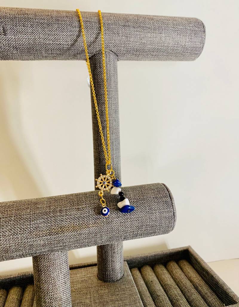 Evil Eye Anhänger An Goldener Kette Mit Lapis Und Howlith Knebel von LeathersDesignCo