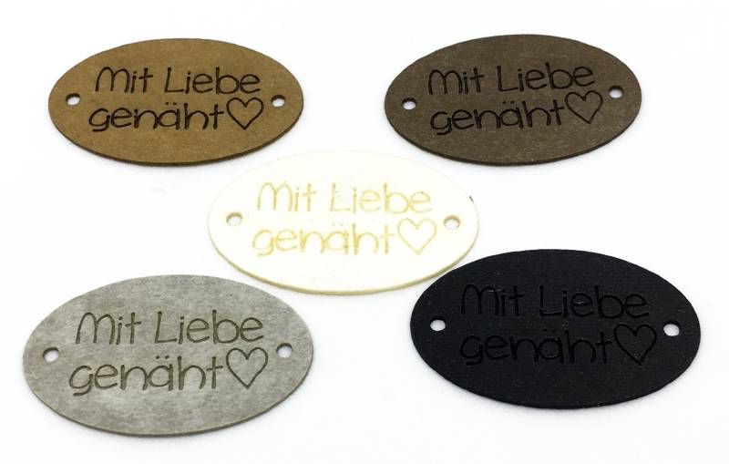 Labels Aus Snappap "Mit Liebe Genäht", Aufnäher Snappap, Veganes Handmade-Label, 30 X 19 Mm Oval Labels Aus Snappap "Mit Liebe Genäht", Aufnäher Snappap, Veganes Handmade-Label, 30 X 19 Mm Oval von Lederetikett
