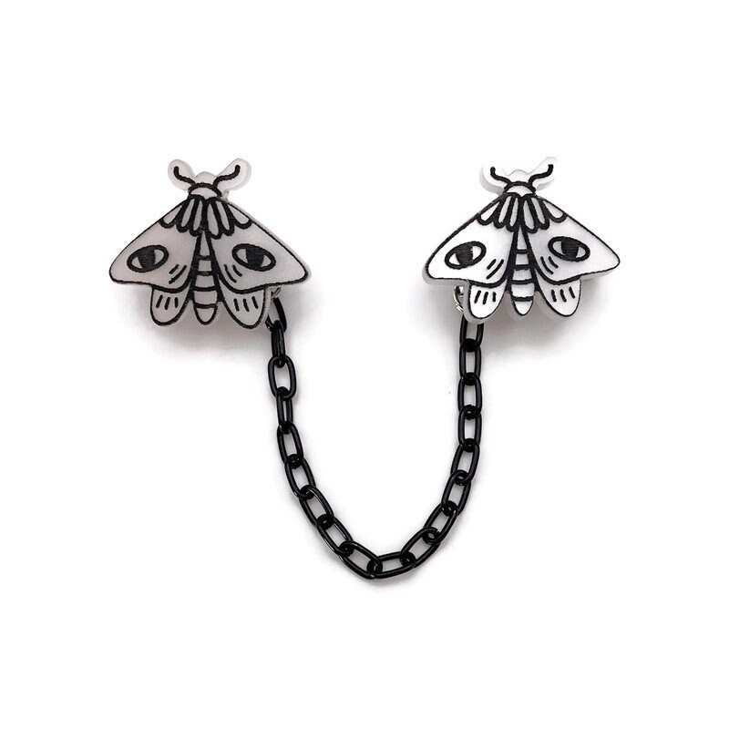 Motte Pullover-Clip Schwarz-Weißer Halloween-strickmantel von LevanterCo