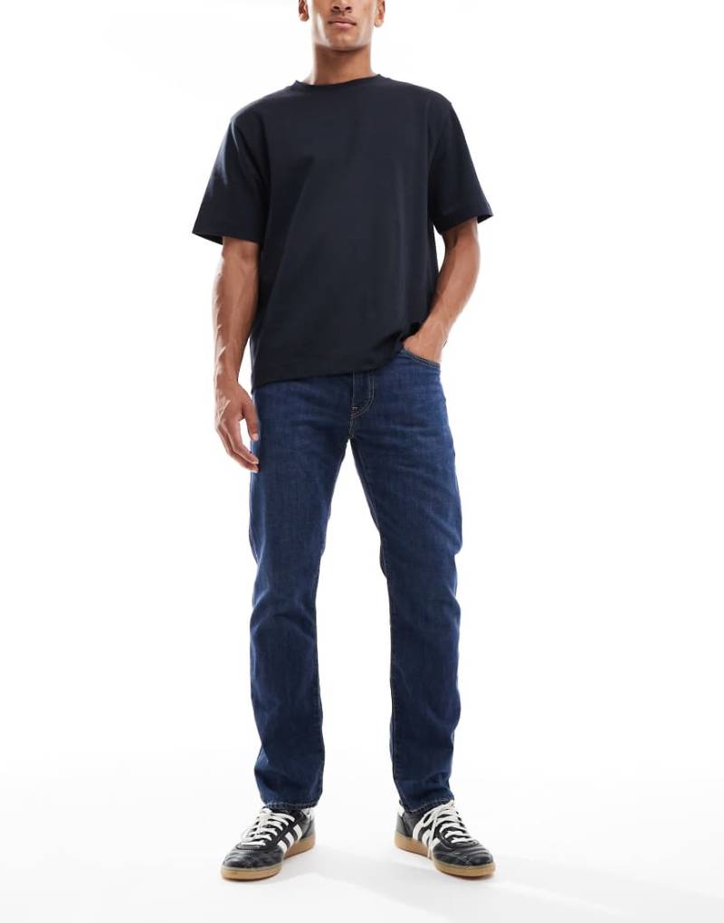 Levi's - 502 - Schmal zulaufende, leichte Jeans in dunkelblauer Waschung-Marineblau von Levi's