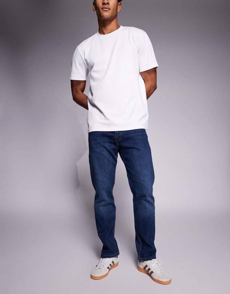 Levi's 502 - Schmal zulaufende Jeans in Mittelblau von Levi's