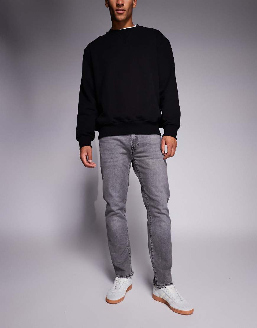 Levi's - 502 - Schmal zulaufende Jeans in grauer Waschung von Levi's