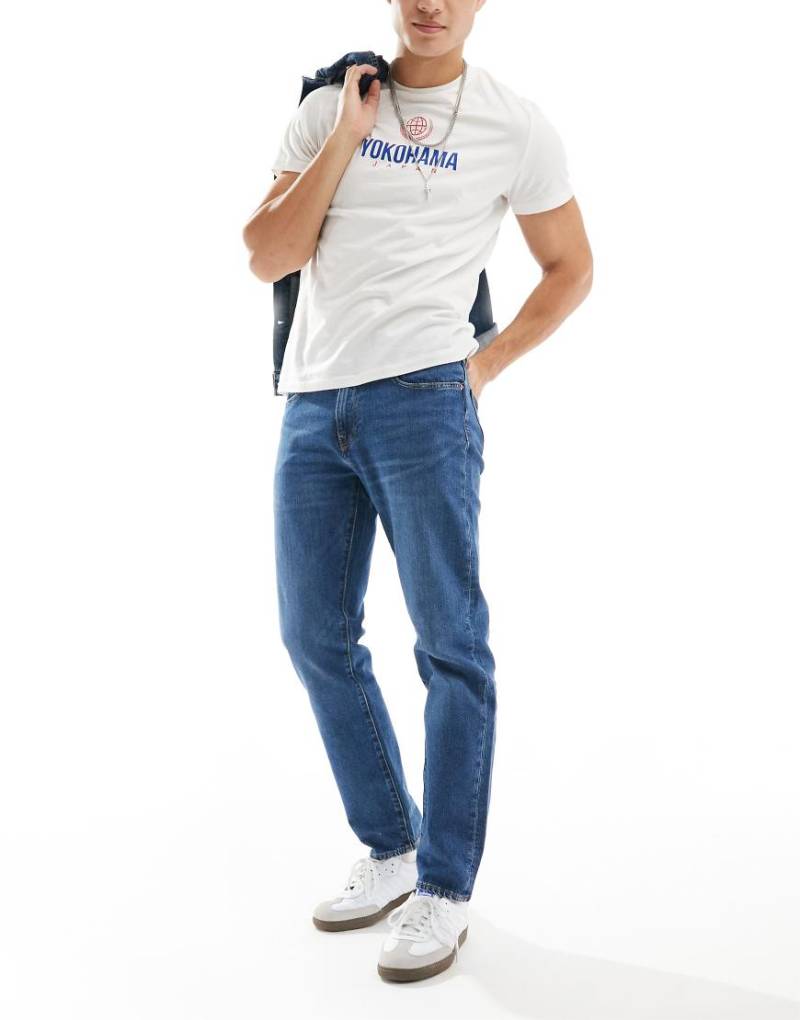 Levi's - 502 - Schmal zulaufende Jeans in marineblauer Waschung von Levi's