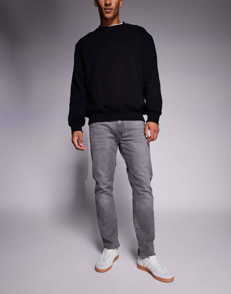 Levi's - 502 - Schmal zulaufende Jeans in grauer Waschung von Levi's