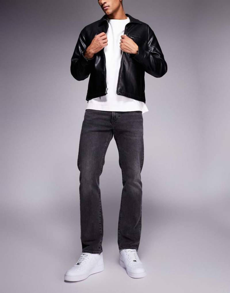 Levi's - 502 - Schmal zulaufende Jeans in schwarzer Waschung von Levi's