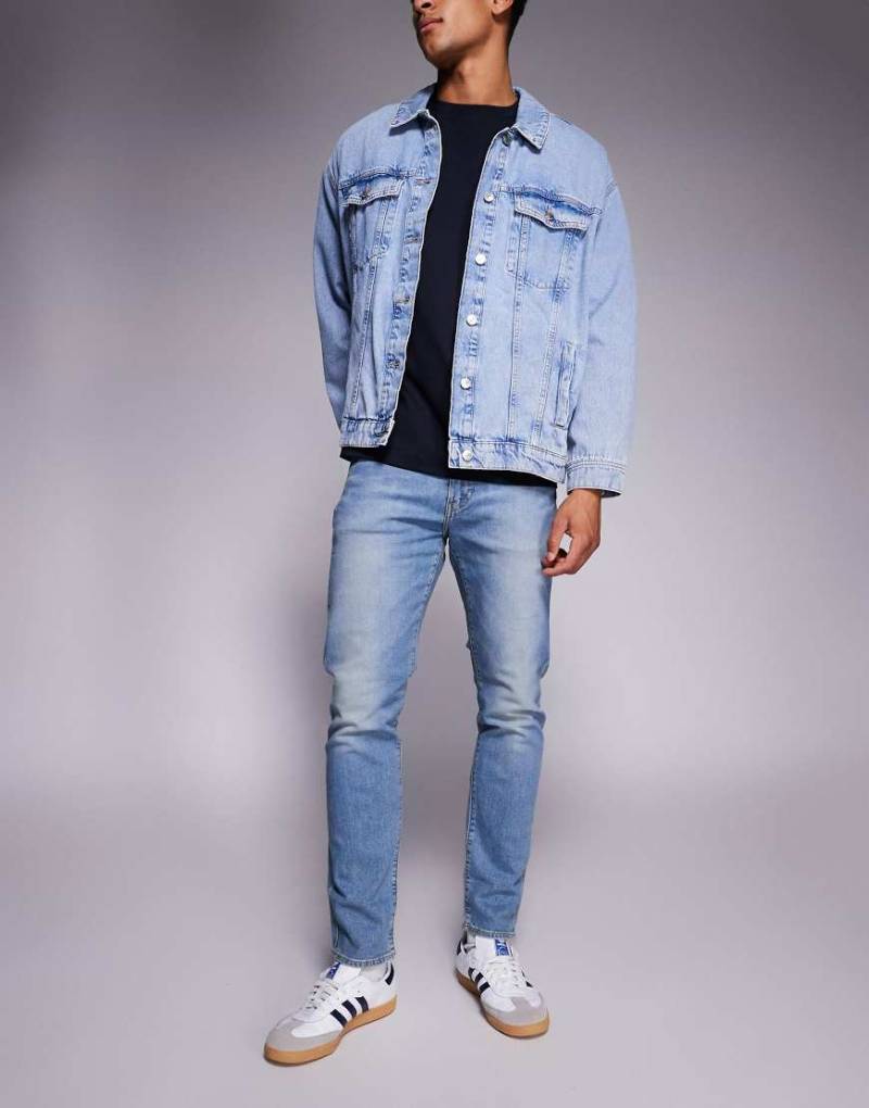 Levi's - 512 - Schmal zulaufende Jeans in mittelblauer Waschung mit schmalem Schnitt von Levi's