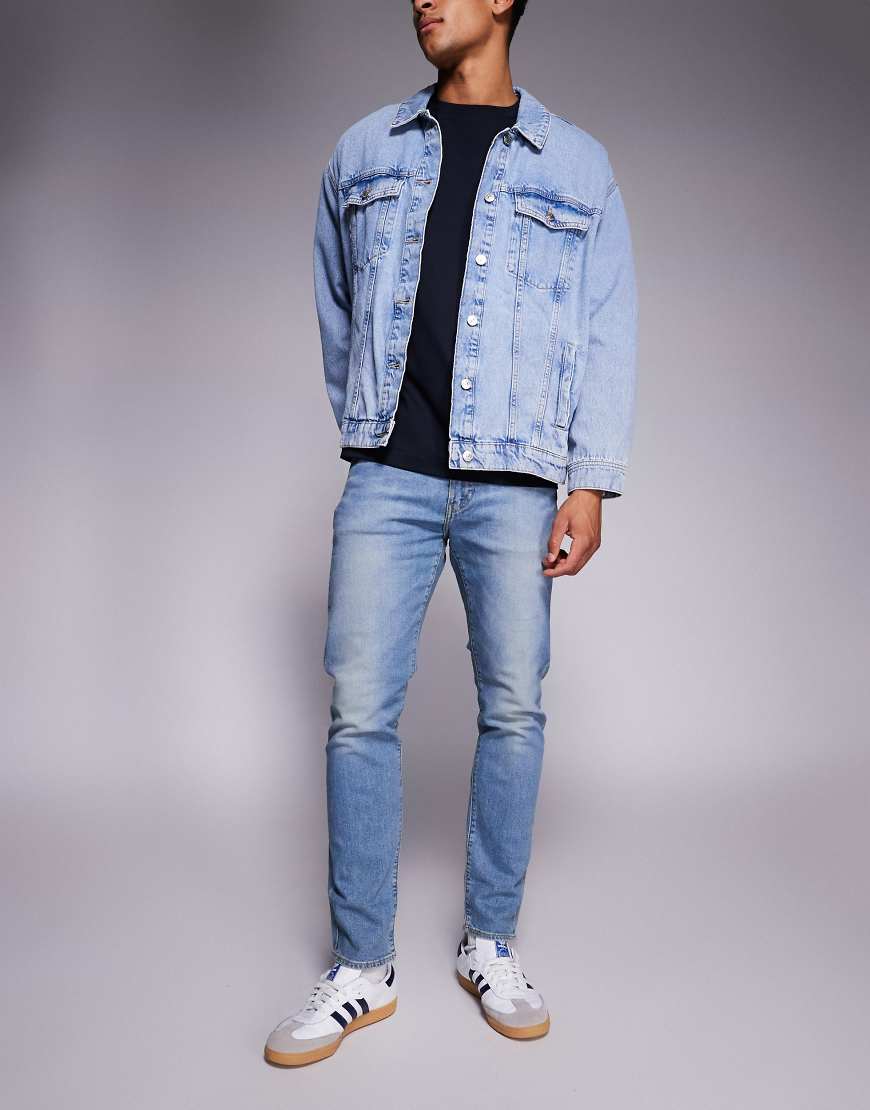 Levi's - 512 - Schmal zulaufende Jeans in mittelblauer Waschung mit schmalem Schnitt von Levi's