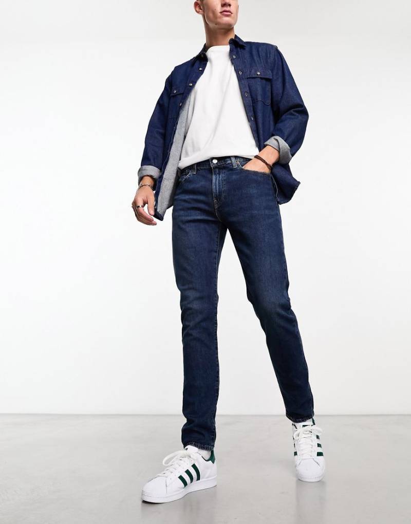 Levi's - 512 - Schmal zulaufende Jeans in verwaschenem dunklem Marineblau mit schmalem Schnitt von Levi's