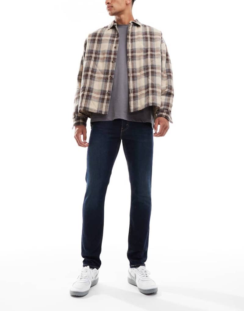 Levi's - 512 - Schmal zulaufende Slim Fit Jeans in dunkelblauer Waschung-Marineblau von Levi's