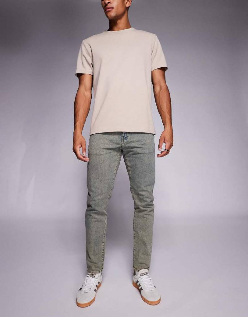 Levi's - 512 - Schmal zulaufende Slim-Fit-Jeans in überfärbtem Sand-Neutral von Levi's