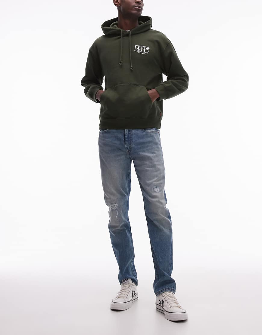 Levi's - 515 - Schmal geschnittene Karottenjeans in mittlerer Waschung mit Zierrissen-Blau von Levi's