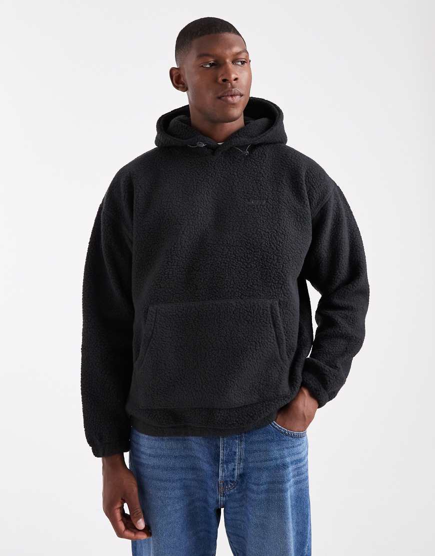 Levi's - Kapuzenpullover aus Teddystoff in Schwarz mit farblich abgestimmtem Logo von Levi's