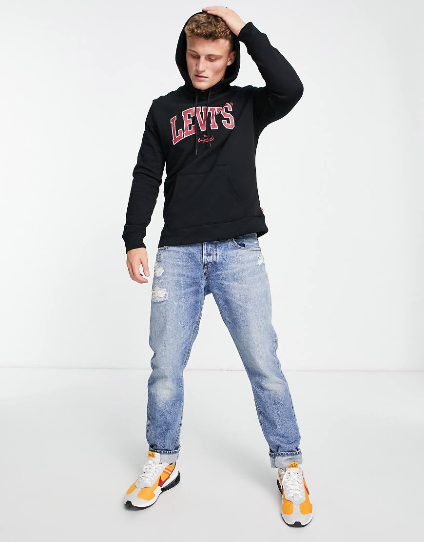 Levi's - Kapuzenpullover in Schwarz mit College-Logo Levi's - Kapuzenpullover in Schwarz mit College-Logo von Levi's