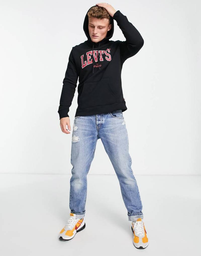 Levi's - Kapuzenpullover in Schwarz mit College-Logo Levi's - Kapuzenpullover in Schwarz mit College-Logo von Levi's
