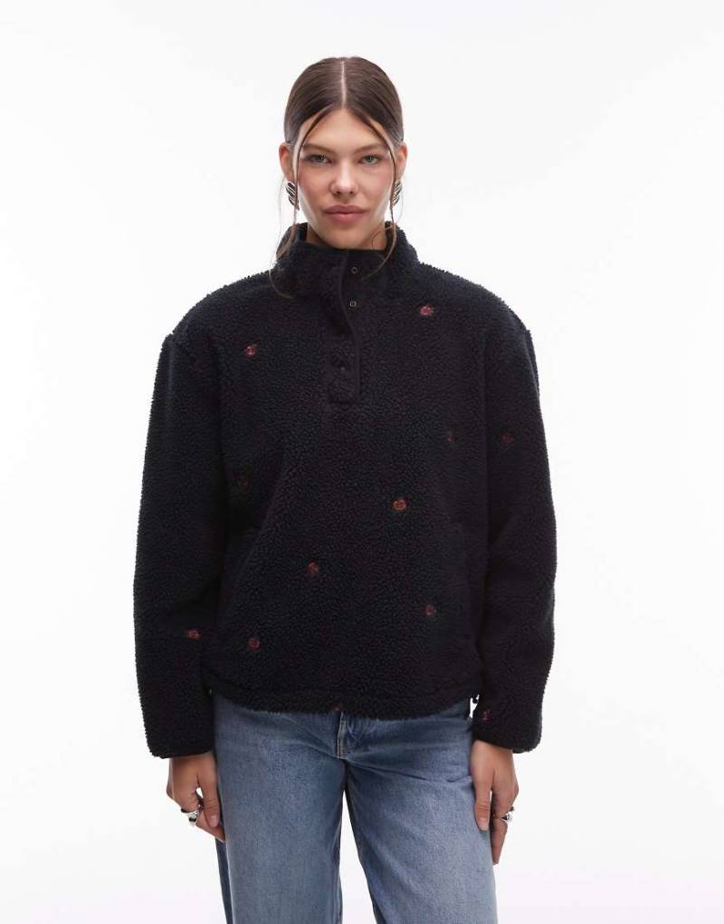 Levi's Kasey - Fleece-Pullover in Schwarz mit Blumenmuster von Levi's