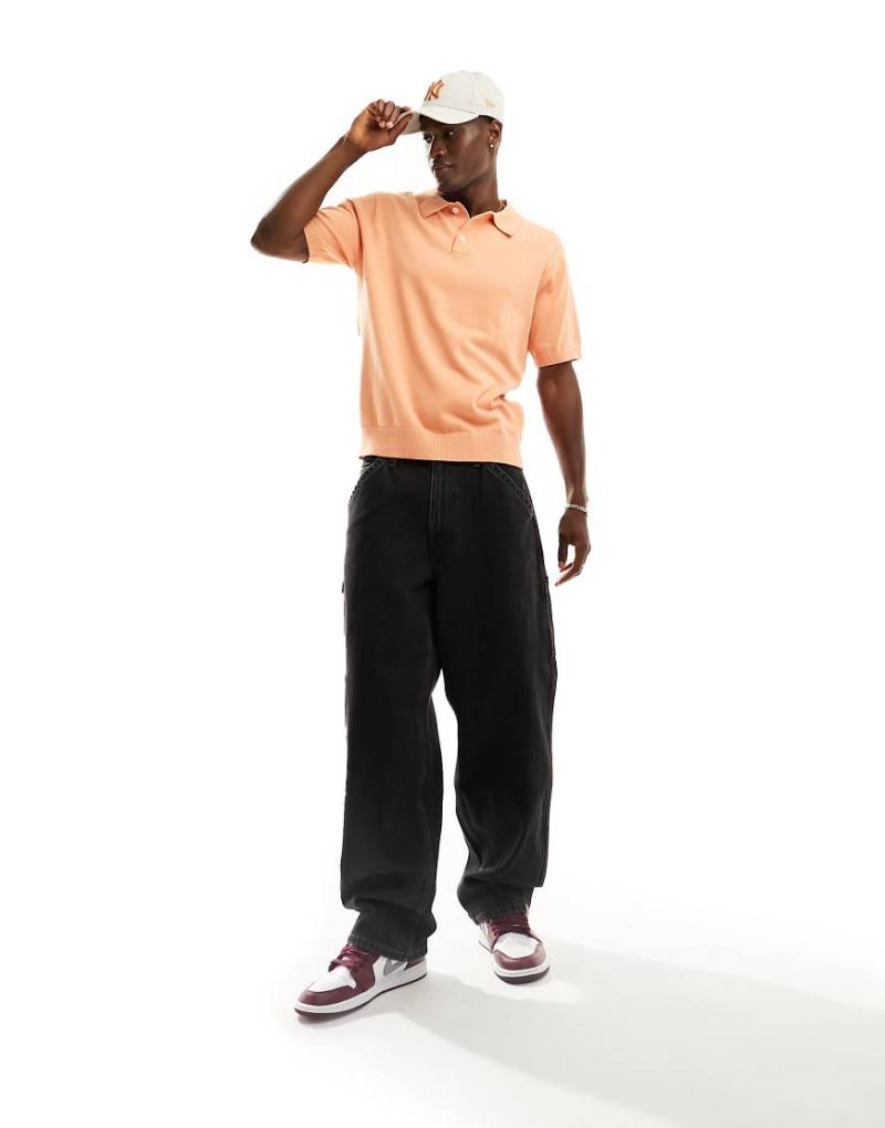 Levi's - Strick-Polohemd in Orange mit kleinem Logo von Levi's
