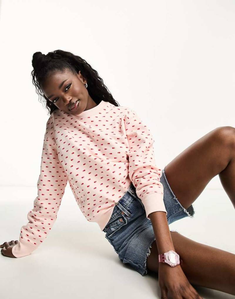 Levi's - Sweatshirt in Rosa mit Rundhalsausschnitt und Grafik-Logo von Levi's