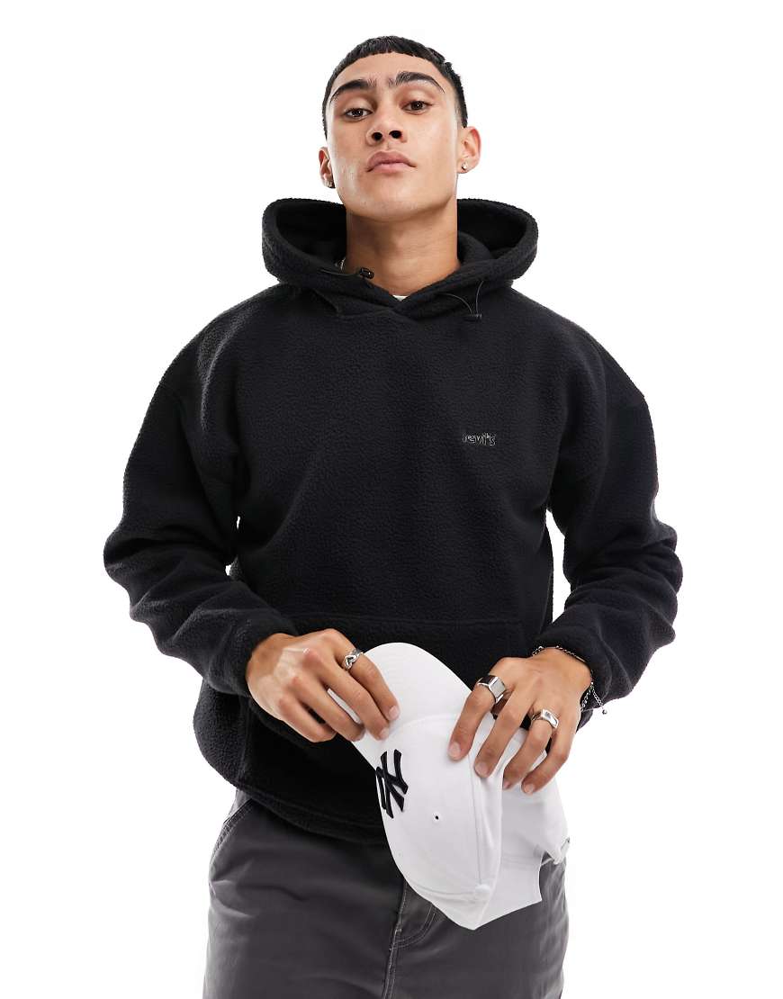 Levi's - Teddystoff-Kapuzenpullover in Schwarz mit kleinem Logo von Levi's