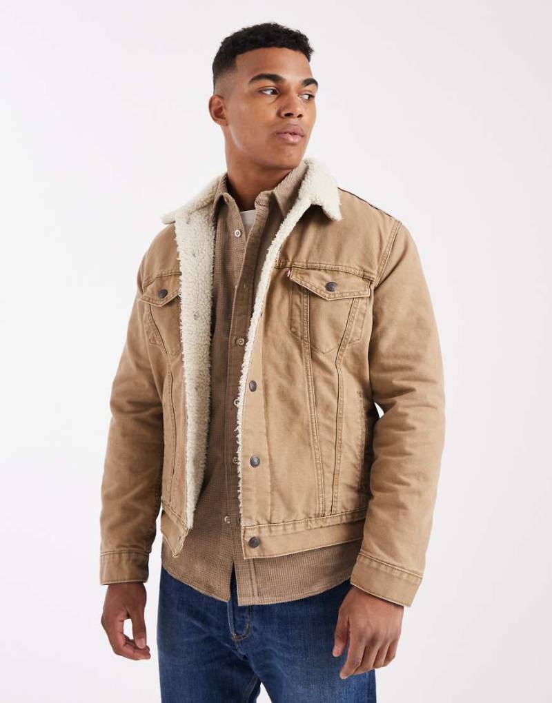 Levi's - Type 3 - Trucker-Jacke aus hellbraunem Canvas mit Futter aus Sherpa-Fleece-Brown von Levi's