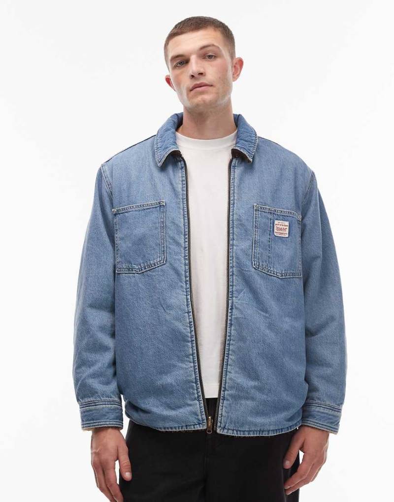 Levi's - Workwear Capsule - Wendbare Hemdjacke aus Jeansstoff in heller Waschung und mit kariertem Teddyfell-Blau Levi's - Workwear Capsule - Wendbare Hemdjacke aus Jeansstoff in heller Waschung und mit kariertem Teddyfell-Blau von Levi's