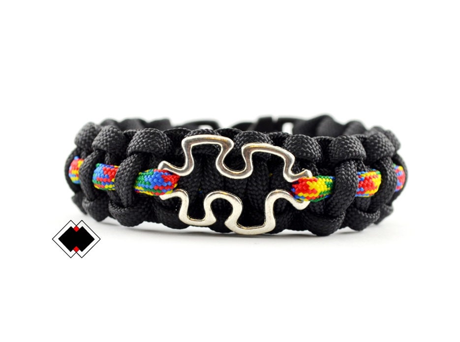 Autism Awareness - 550 Paracord Survival Armband Schwarz Mit Multicolor Dünne Linie Und Puzzle Handgemacht Autism Awareness - 550 Paracord Survival Armband Schwarz Mit Multicolor Dünne Linie Und Puzzle Handgemacht von LifelineOutdoorGear