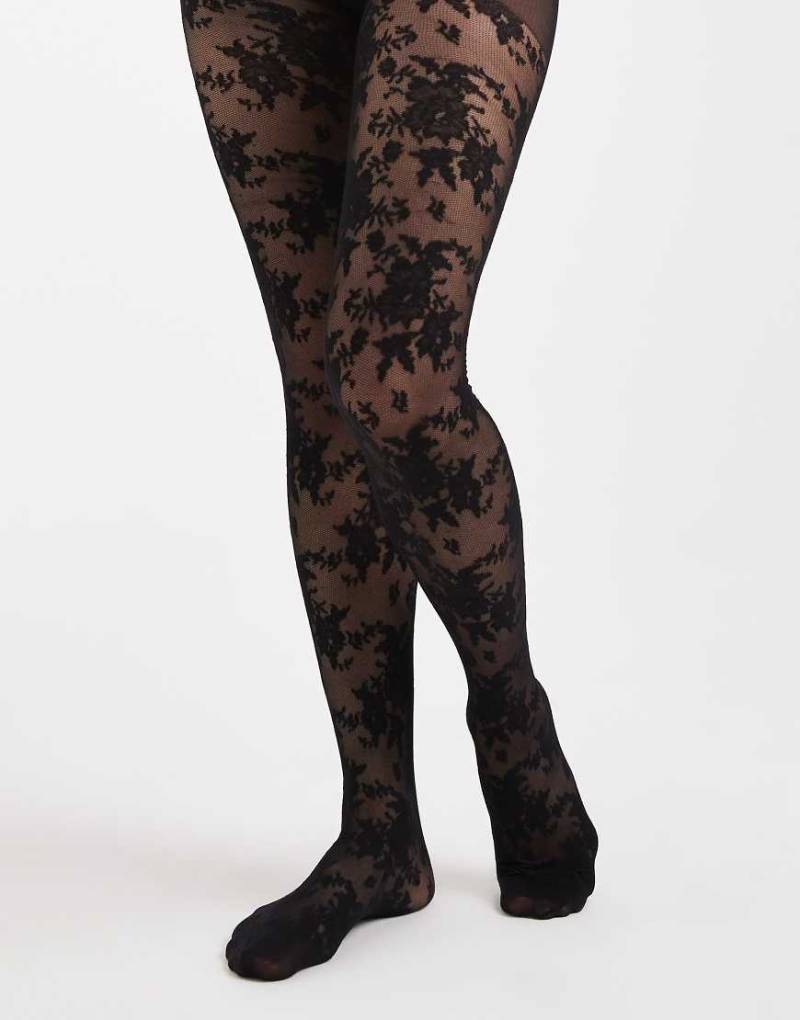 Lindex - Strumpfhose aus floraler Spitze in Schwarz, 40 DEN Lindex - Strumpfhose aus floraler Spitze in Schwarz, 40 DEN von Lindex