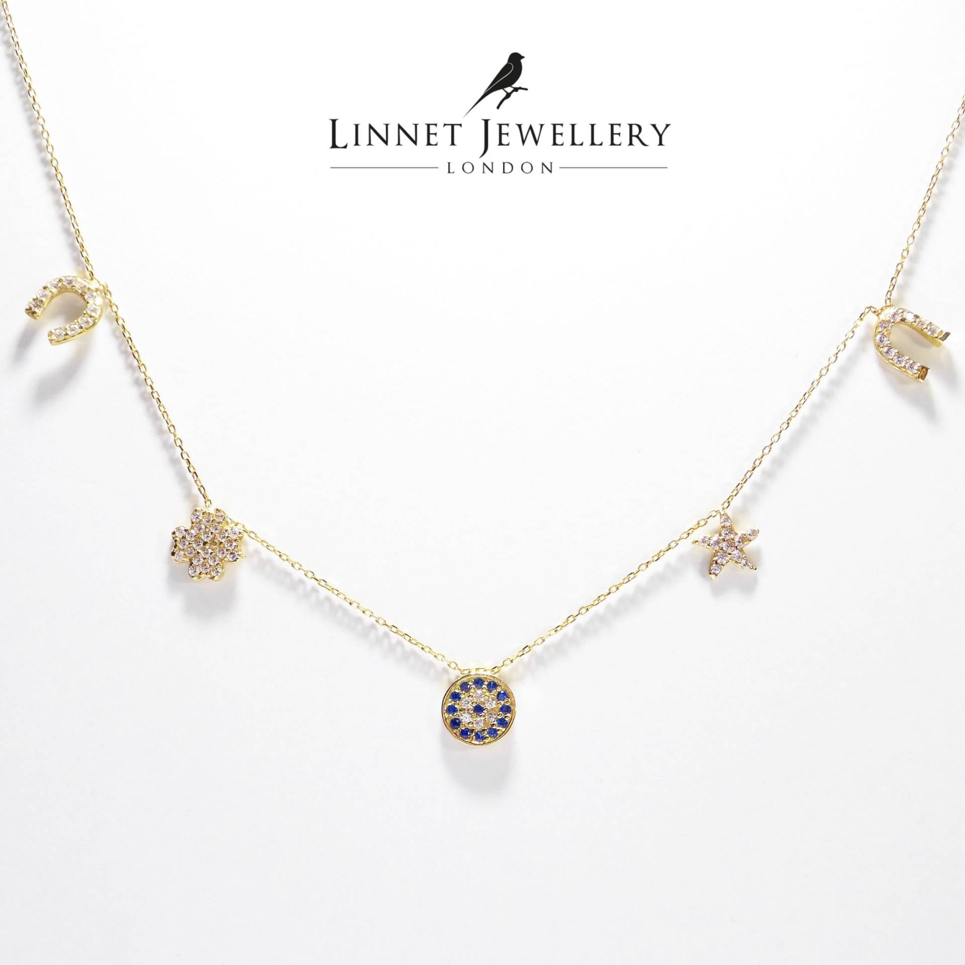 Pferdeschuh Kleeblatt Seestern Evil Eye 14K Gelbgold Glückskette von LinnetJewellery