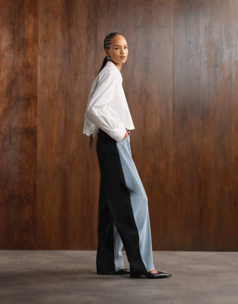 Lioness - Horseshoe - Jeans mit abgerundetem Beinschnitt und Kontrastdesign in Schwarz und Blau von Lioness